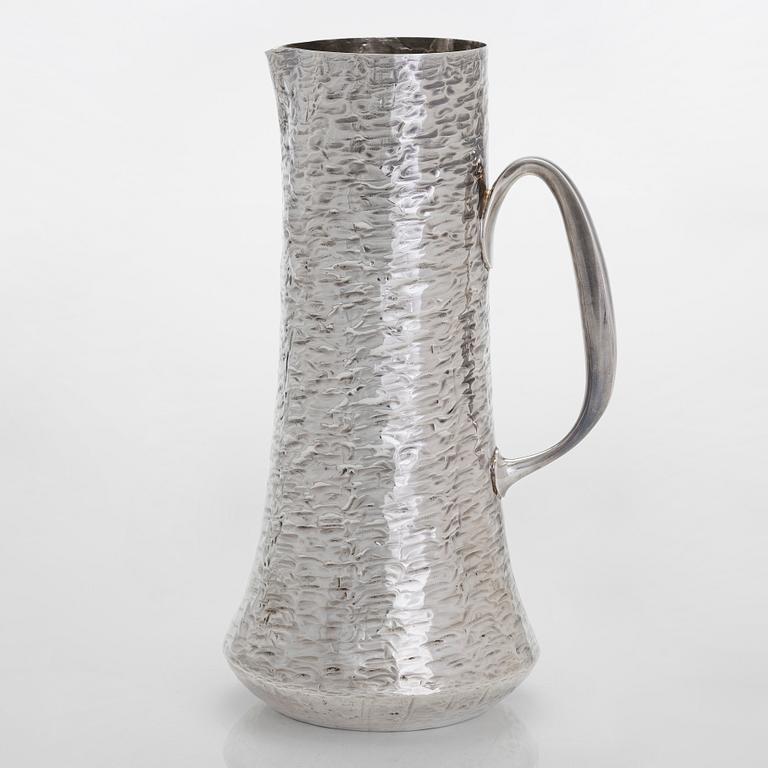Tapio Wirkkala, a sterling silver pitcher with eight beakers, Hämeenlinna Finland 1973-1978.