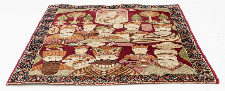 A Persian Kerman Laver 'Mashahir' ('The rulers of the world') rug, c. 82 x 63 cm.