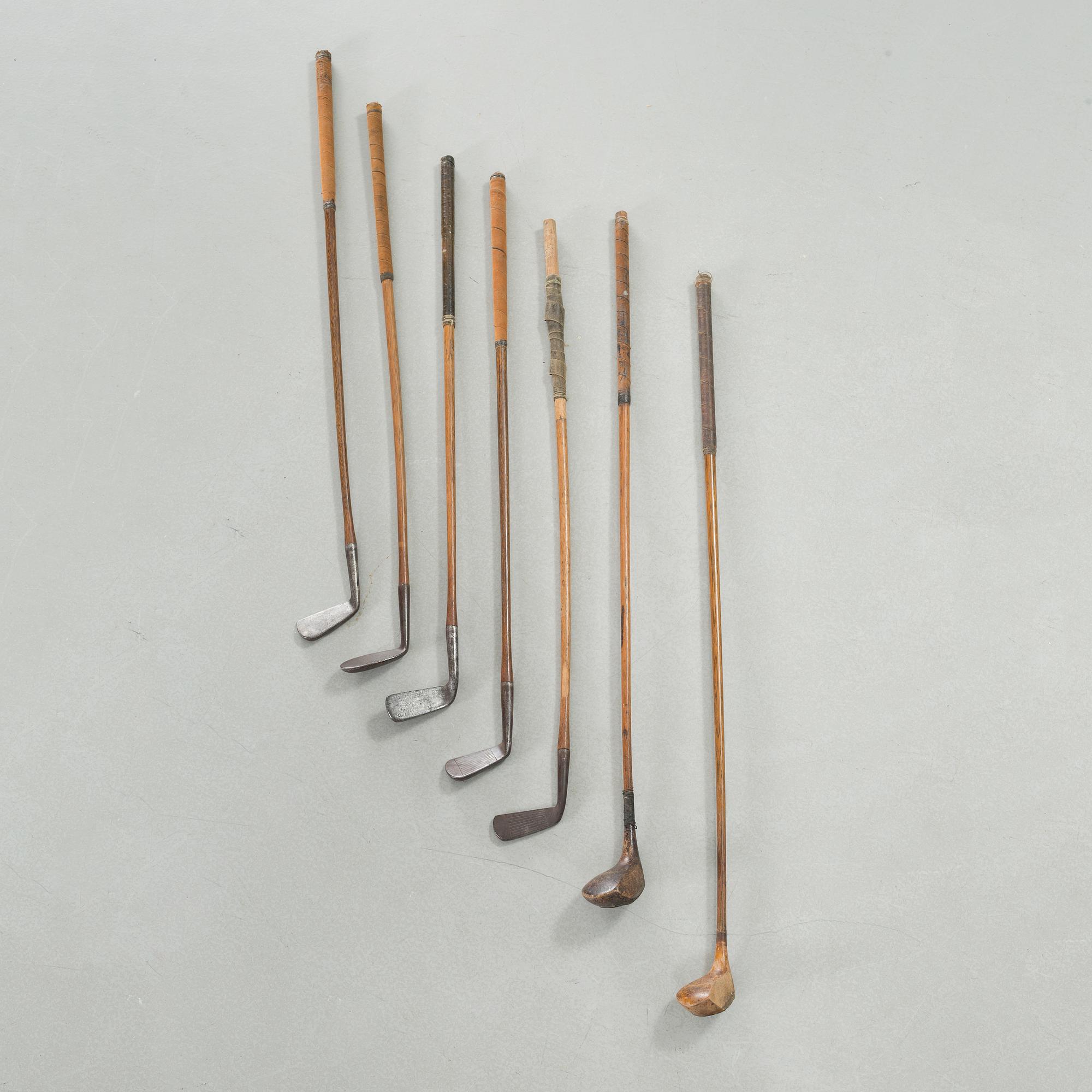 Seven golf clubs with bag, clubs by by "J Winton" & "Josh Taylor",, first half of the 20th century.