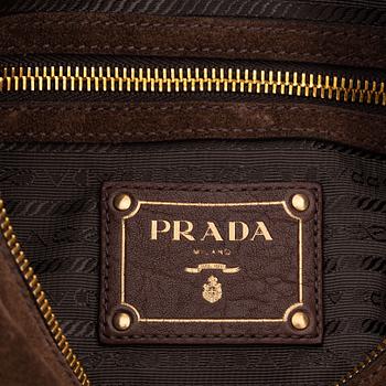 Prada, a brown suede handbag.