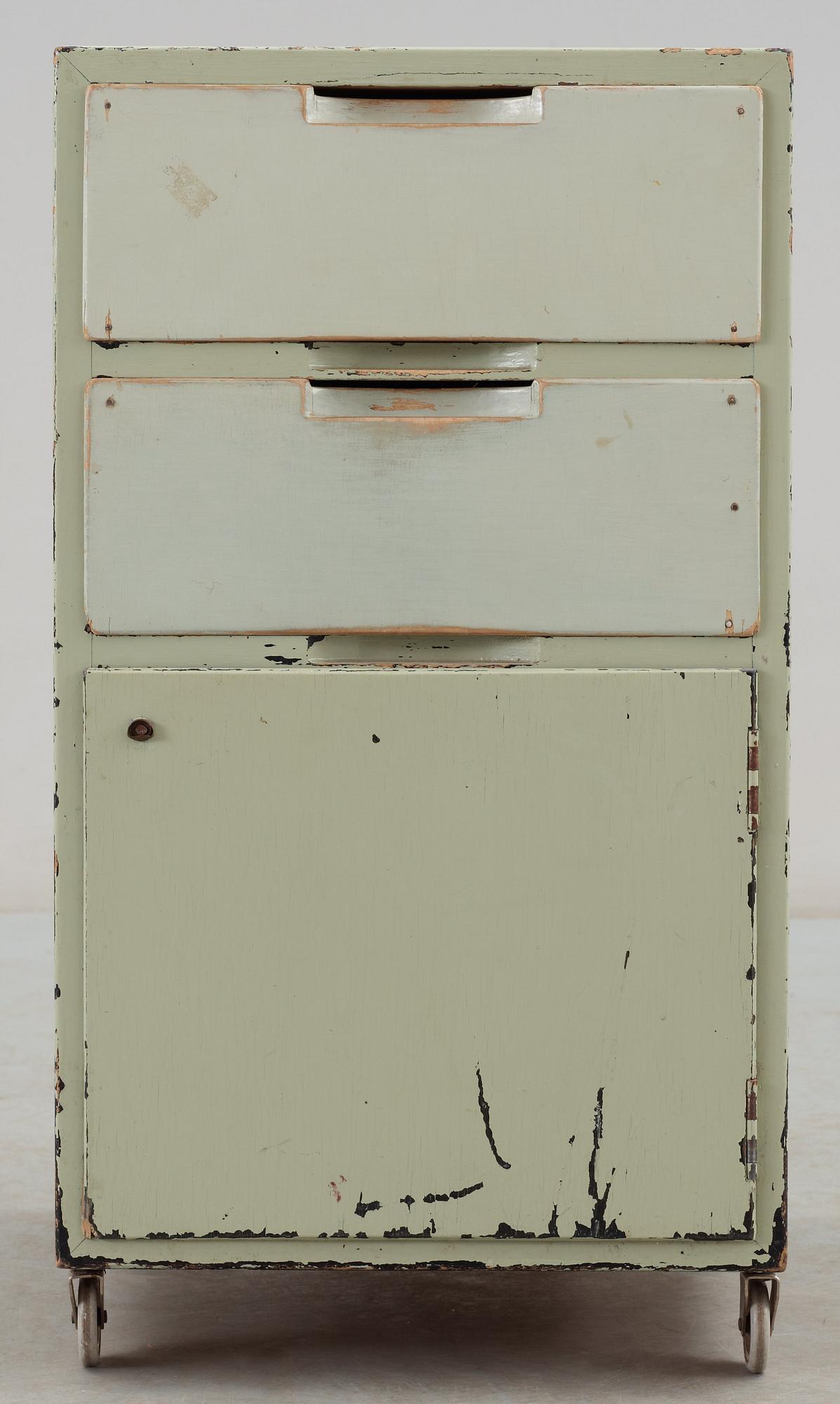 An Alvar Aalto green lacquered plywood bedside locker, Huoneakalu-ja Rakennustyötehdas Oy, Finland 1930's.