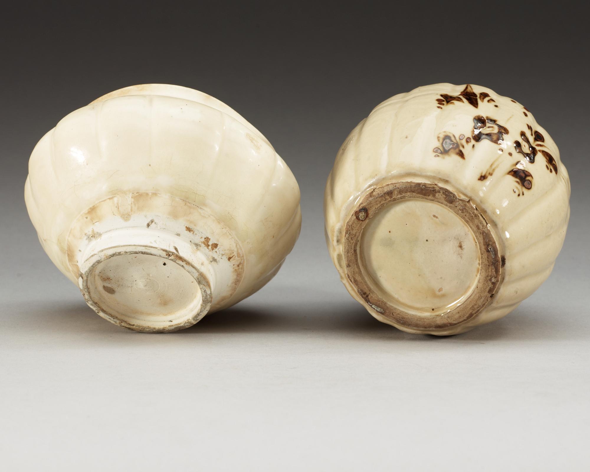 A white glazed bowl and a chizhou vase, Song (960-1279) and Yuan dynasty (1271-1368).