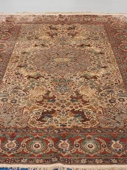 A RUG. A semi-antique silk figural souf (in relief), probably India. 208 x 128,5 cm (as well as two cm flat weave at.