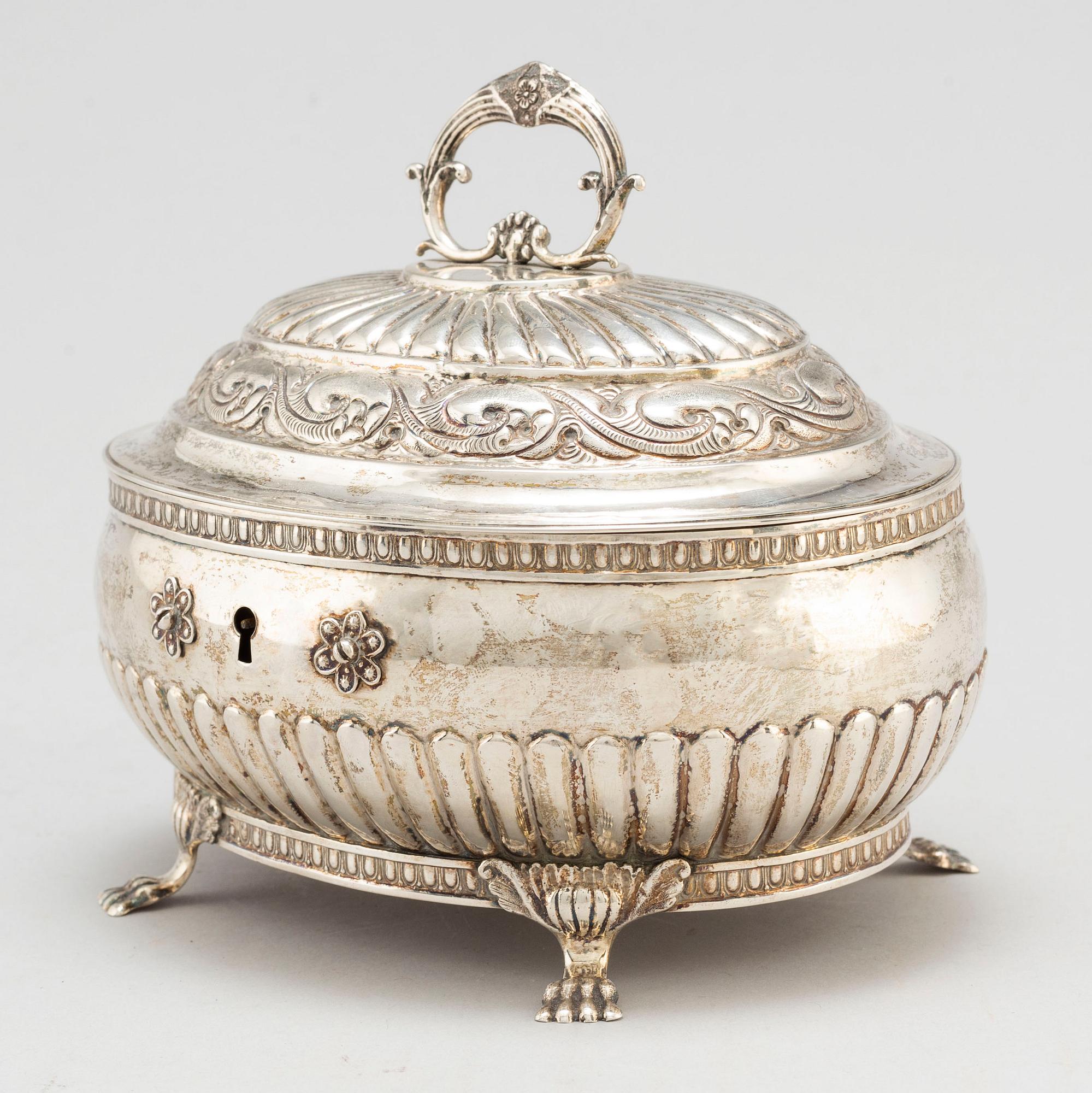 A silver sugarbox by Eric Söderholm Härnösand 1844.