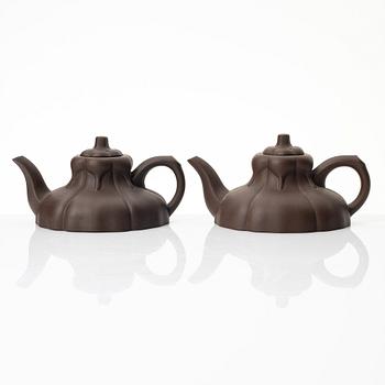 Two similar 'magnolia flower six-petal' yixing teapots, China, 1980s.