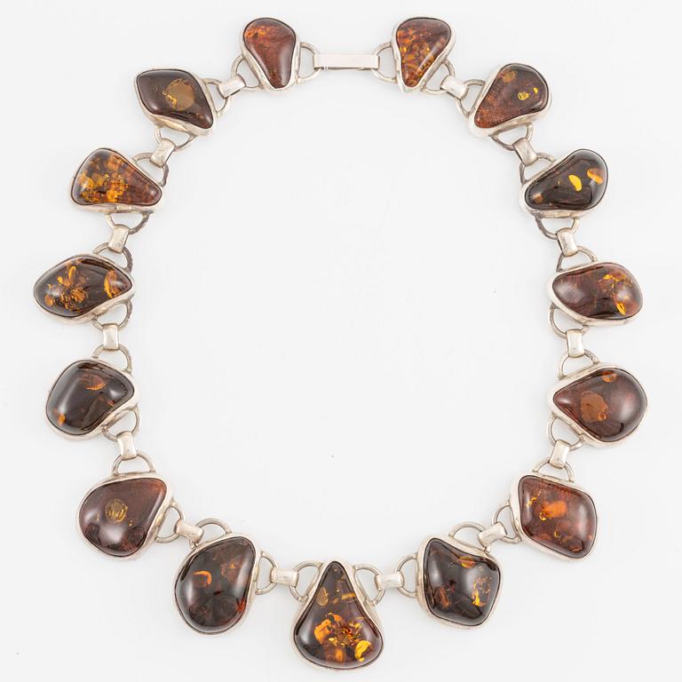 Necklace, sterling silver and amber.