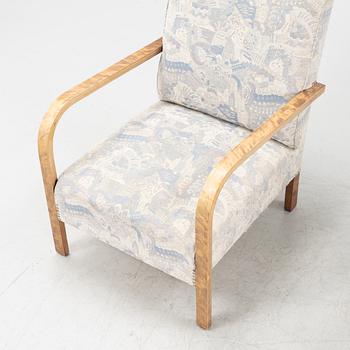 A pair of 1930's armchairs.