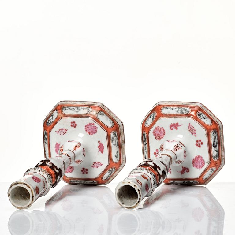 A pair of rouge de fer and grisaille export candle sticks, Qing dynasty, Qianlong (1736-95).