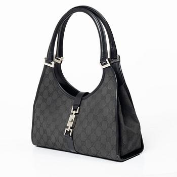 Gucci, a 'Jackie' bag.
