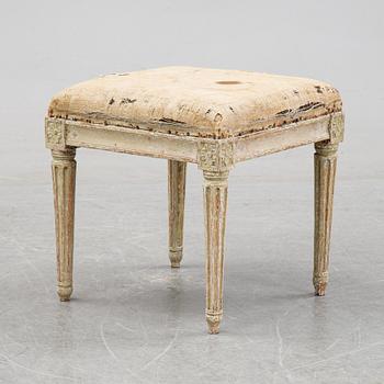 A Gustavian stool.