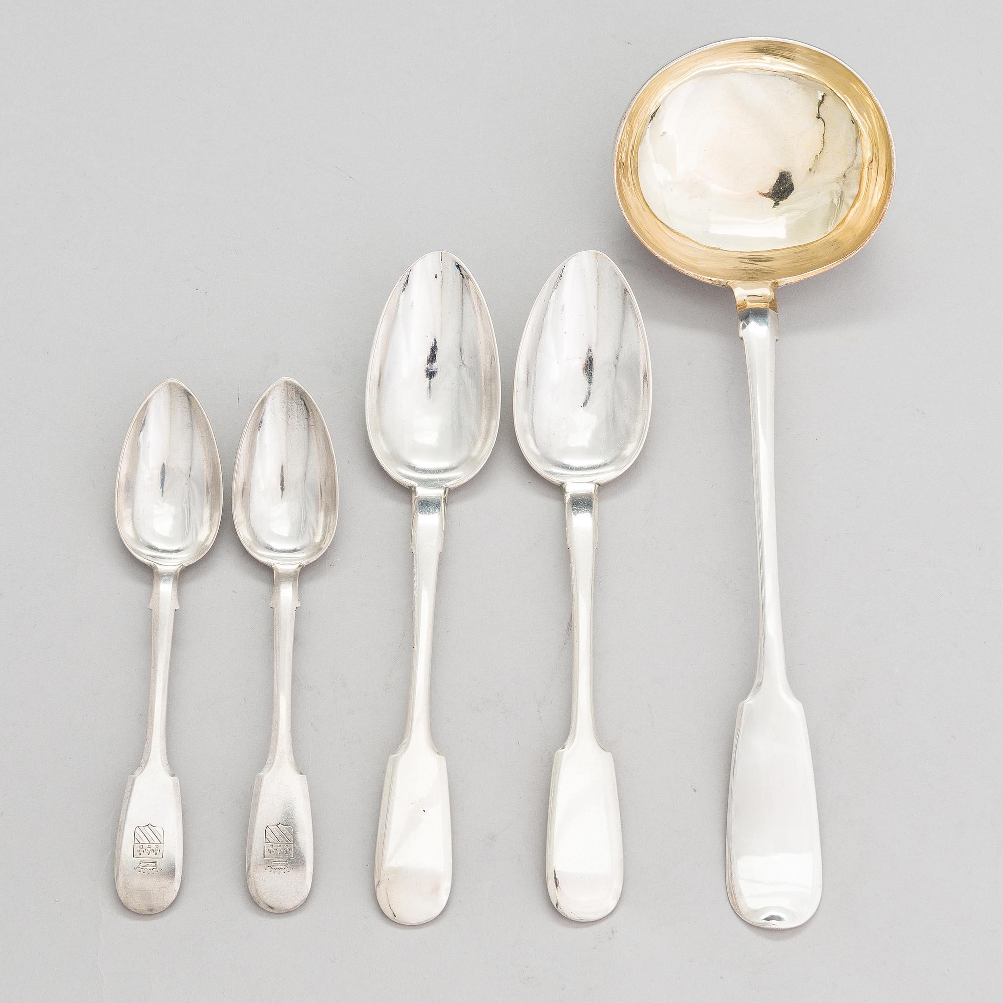 A Russian silver soup ladle and two pairs of silver spoons, Moscow 1874 and Saint Petersburg 1868 and 1887.
