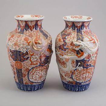 A pair of Japanese porcelain vases, 19th Century.