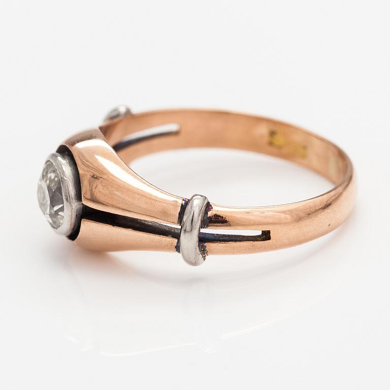 A 14K gold ring with a ca. 0.66 ct old-cut diamond.