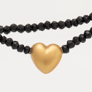 Ole Lynggaard, necklace faceted onyxbeads and clasp 18K gold, dustbag and original case.