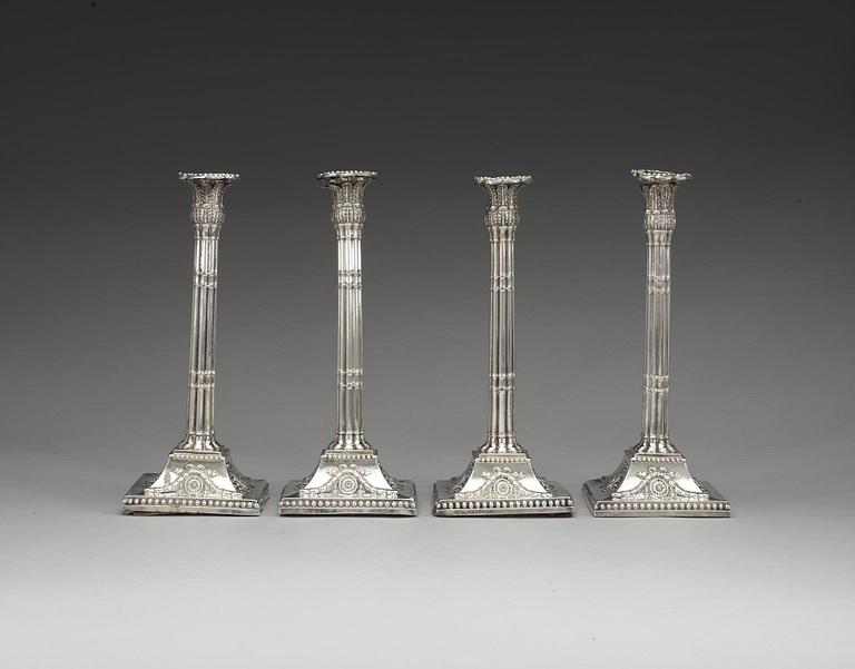 A set of four English silver candlesticks, marks of William Holmes, London 1772.