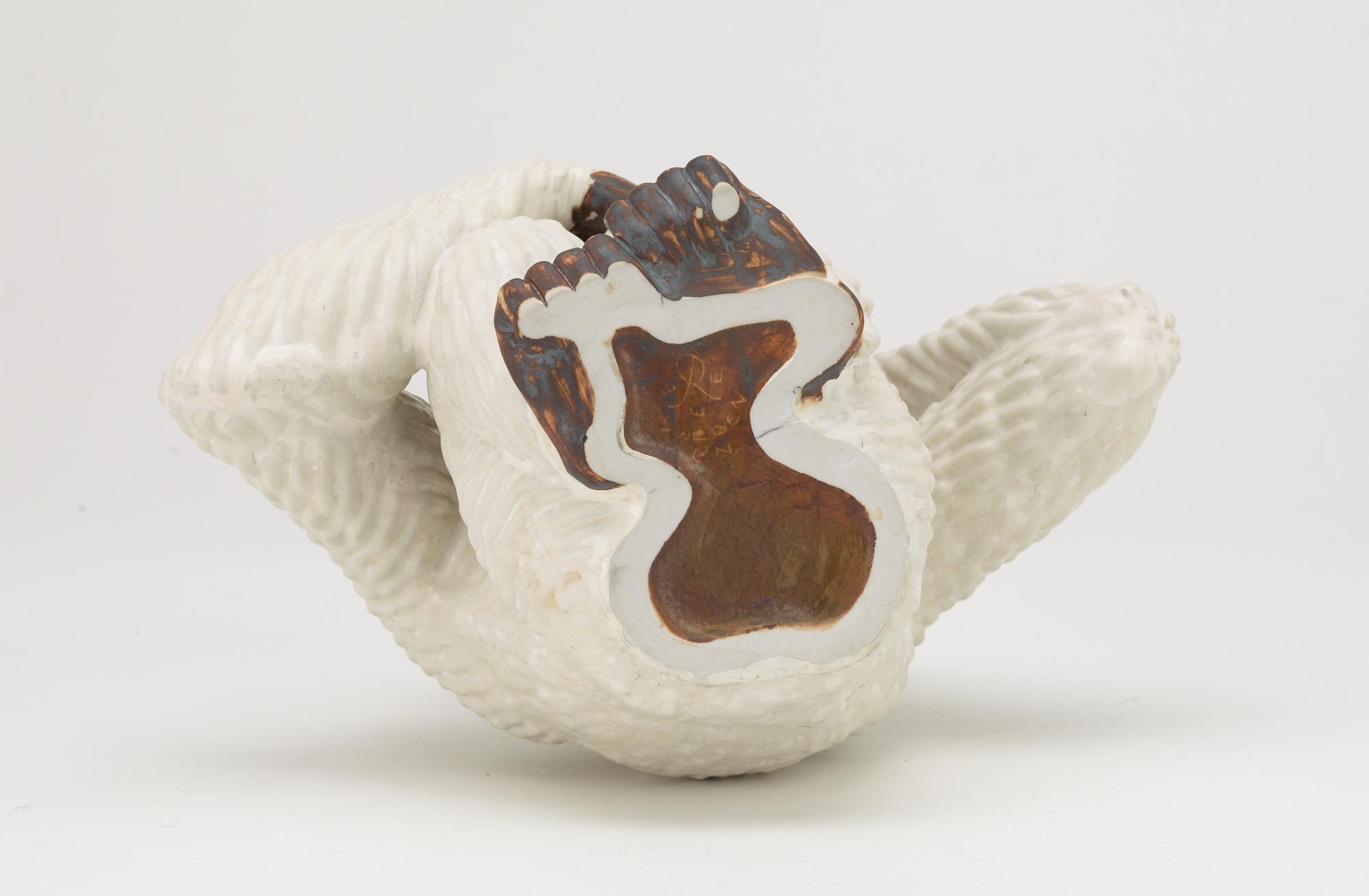 A Gunnar Nylund stoneware figure of a chimpanzee, Rörstrand.