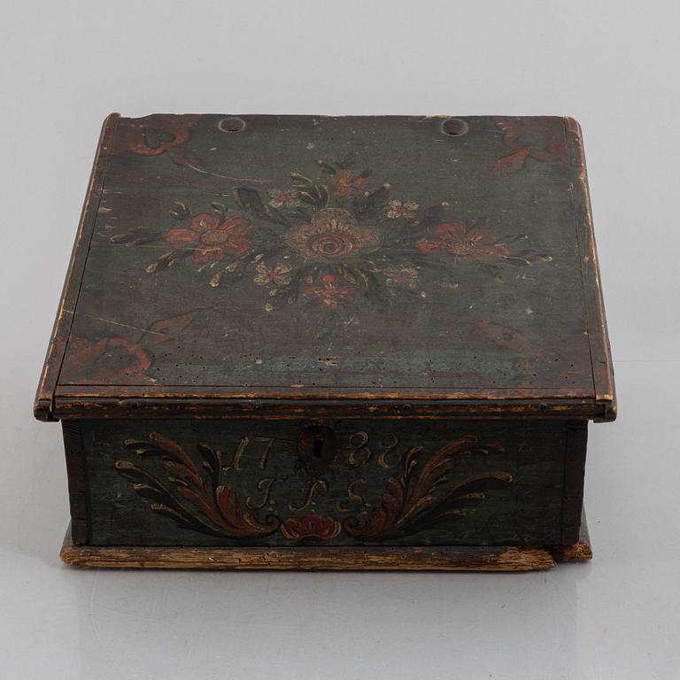 A Swedish polychrome-painted writing box, dated 1788.