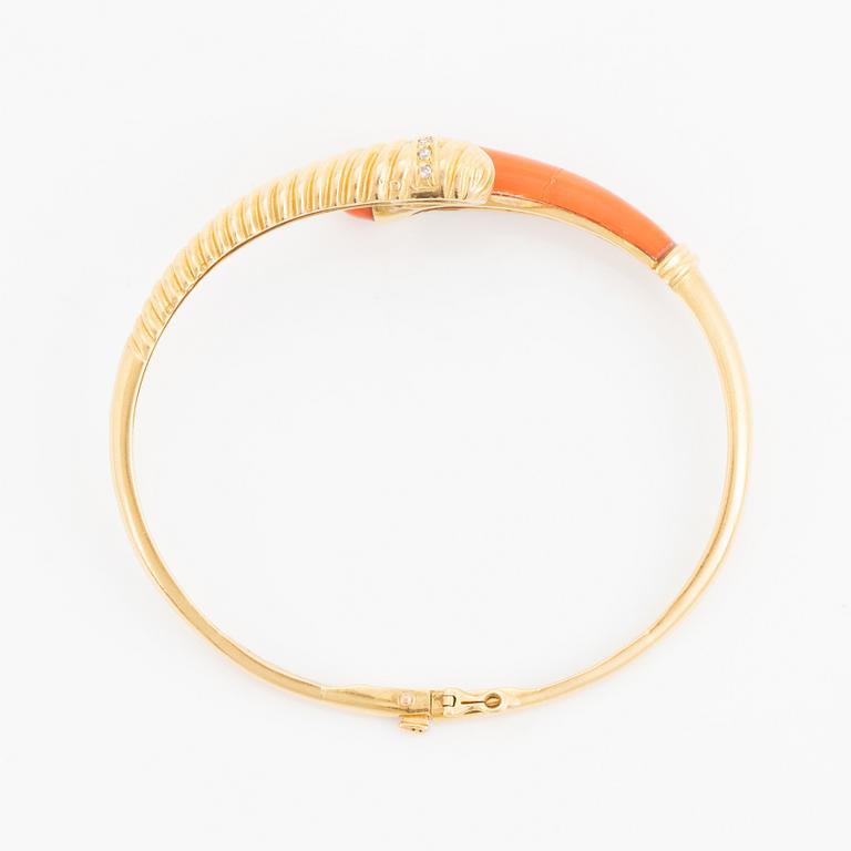 Gold and coral and diamond bangle.