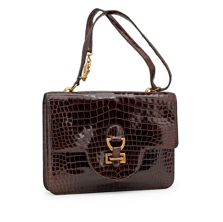 HERMÈS, a brown crocodile leather handbag.