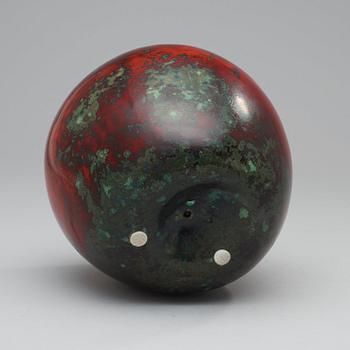 A Hans Hedberg faience apple, Biot, France.