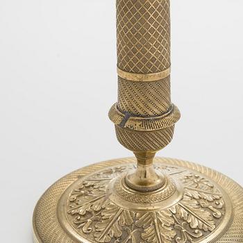 A pair of Empire style candlesticks, around 1900.