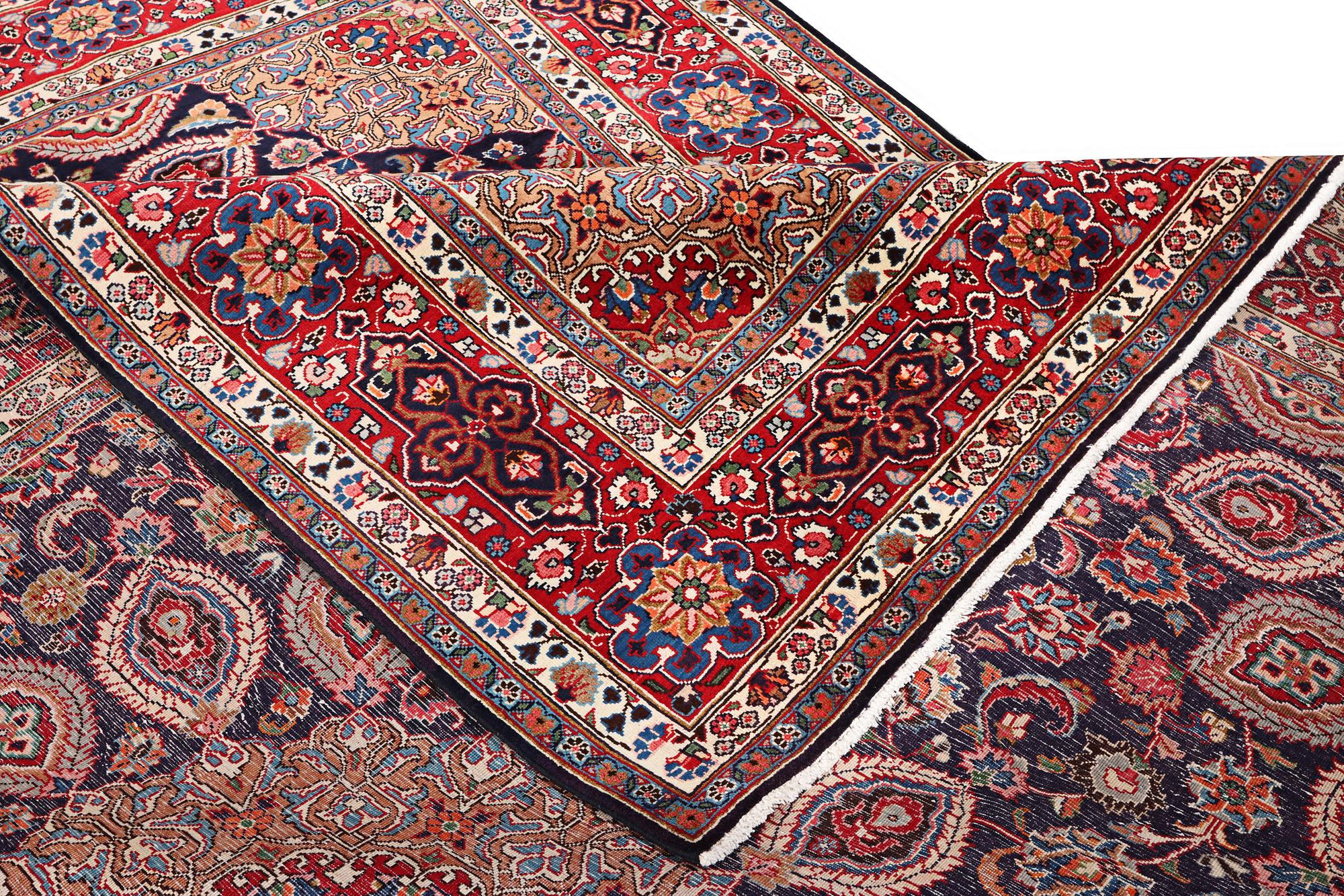 A Meshed carpet, c. 352 x 253 cm.