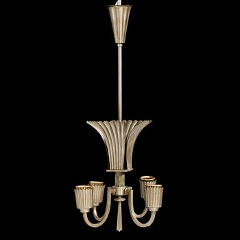 A 1920-30's white metal four-light ceiling lamp.