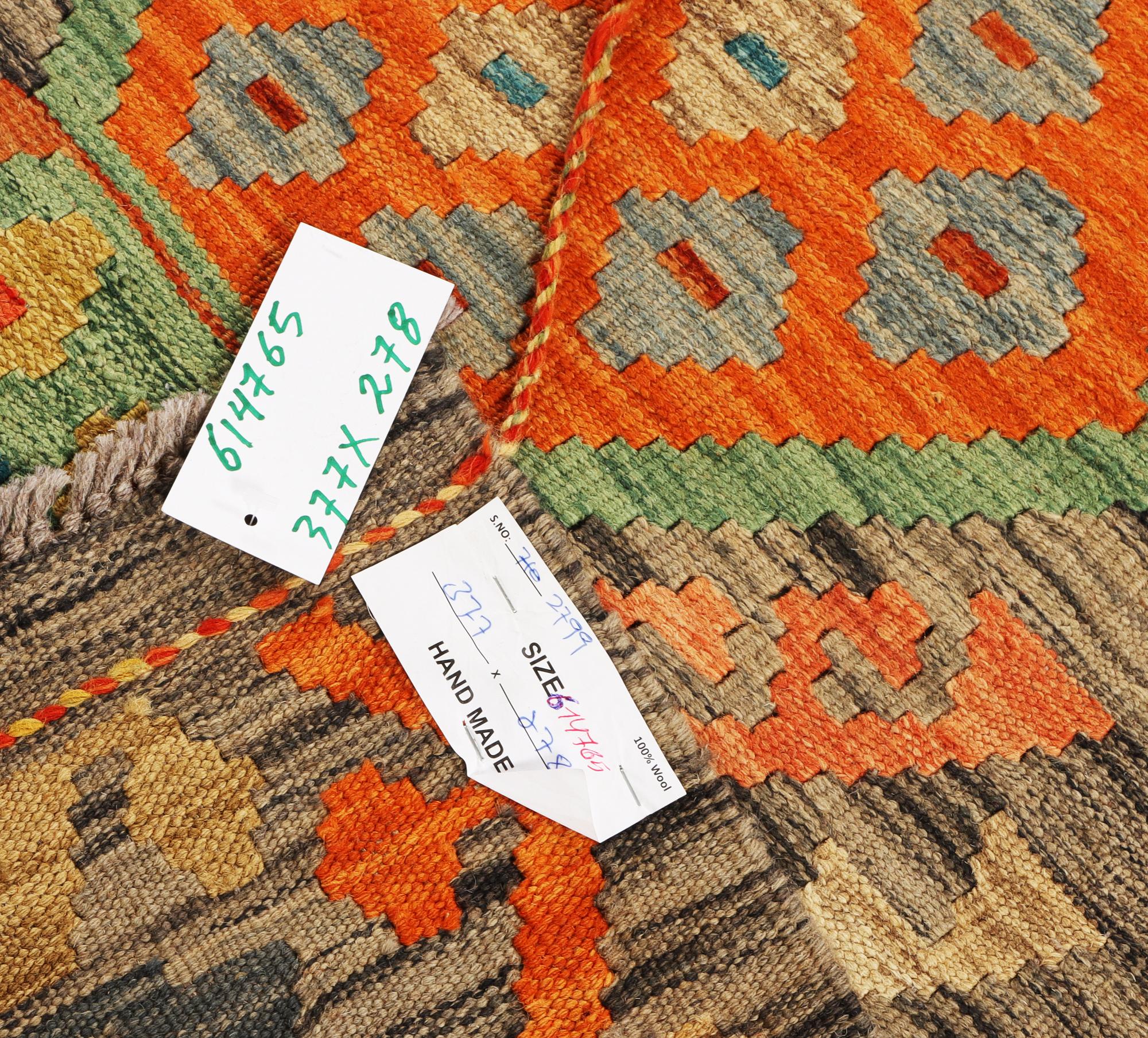 A Kilim carpet, c. 377 x 278 cm.