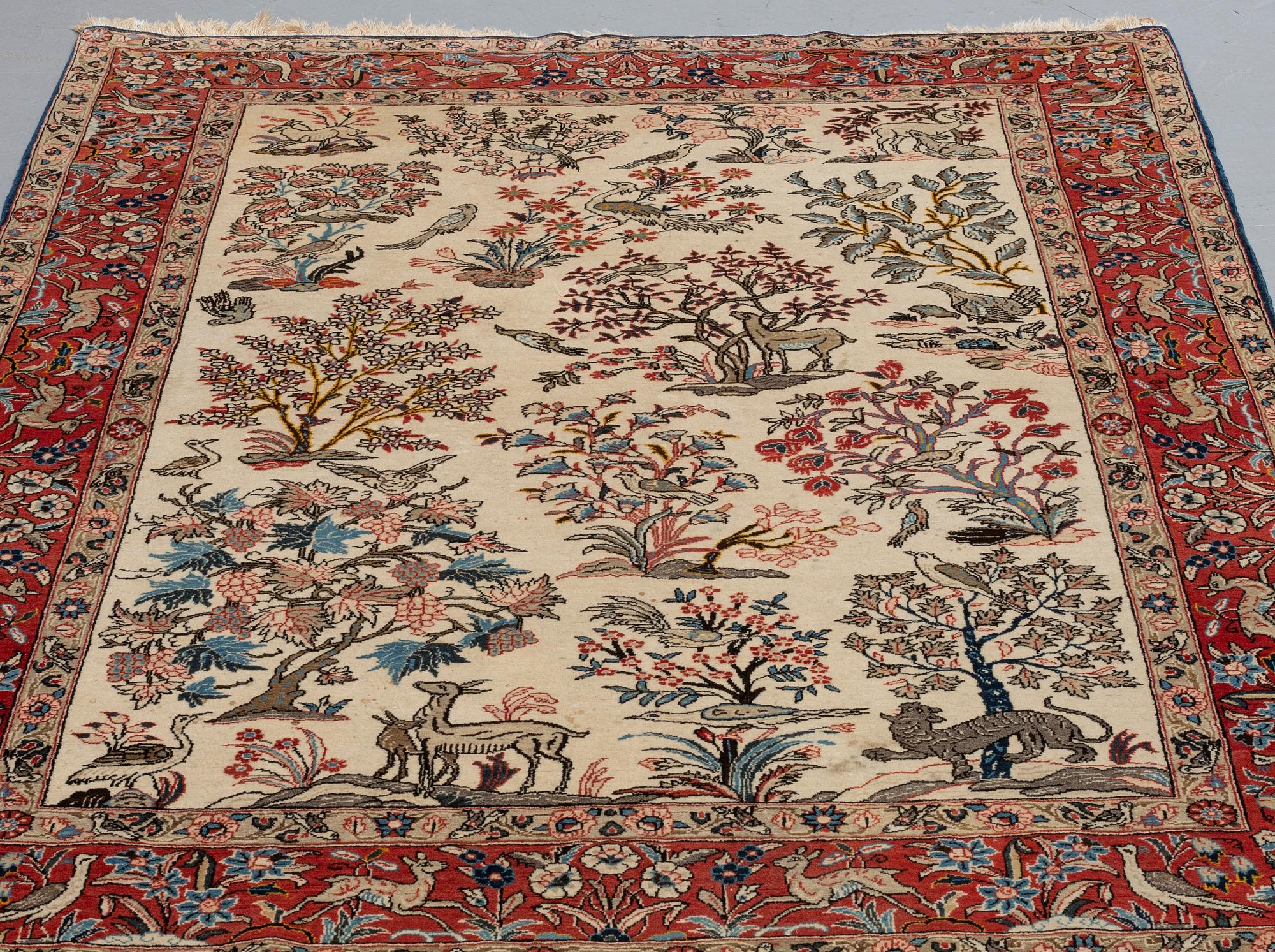 A RUG, an old Qum, figural, Iranian, ca 211-213,5 x 143,5-148 cm.