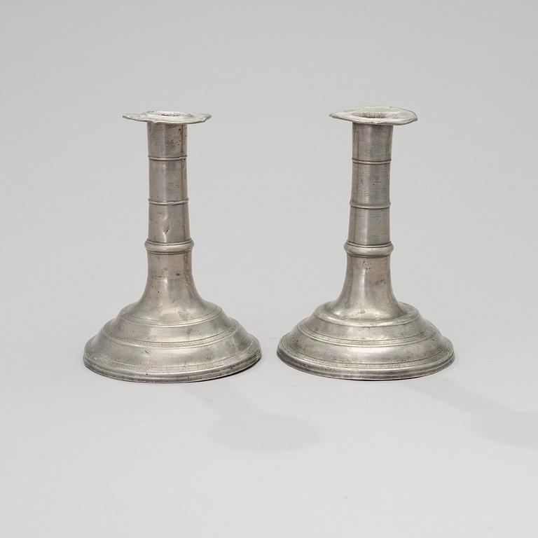 A PAIR OF PEWTER CANDLESTICKS, Johan Gustaf Almqvist, Turku, 1820 and 1823.