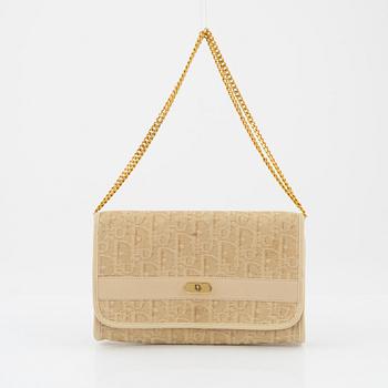 Christian Dior, a monogram clutch.