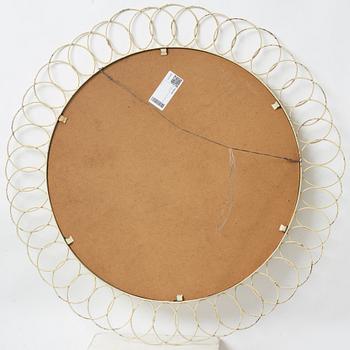 A painted metal mirror, first half of the 20th century.