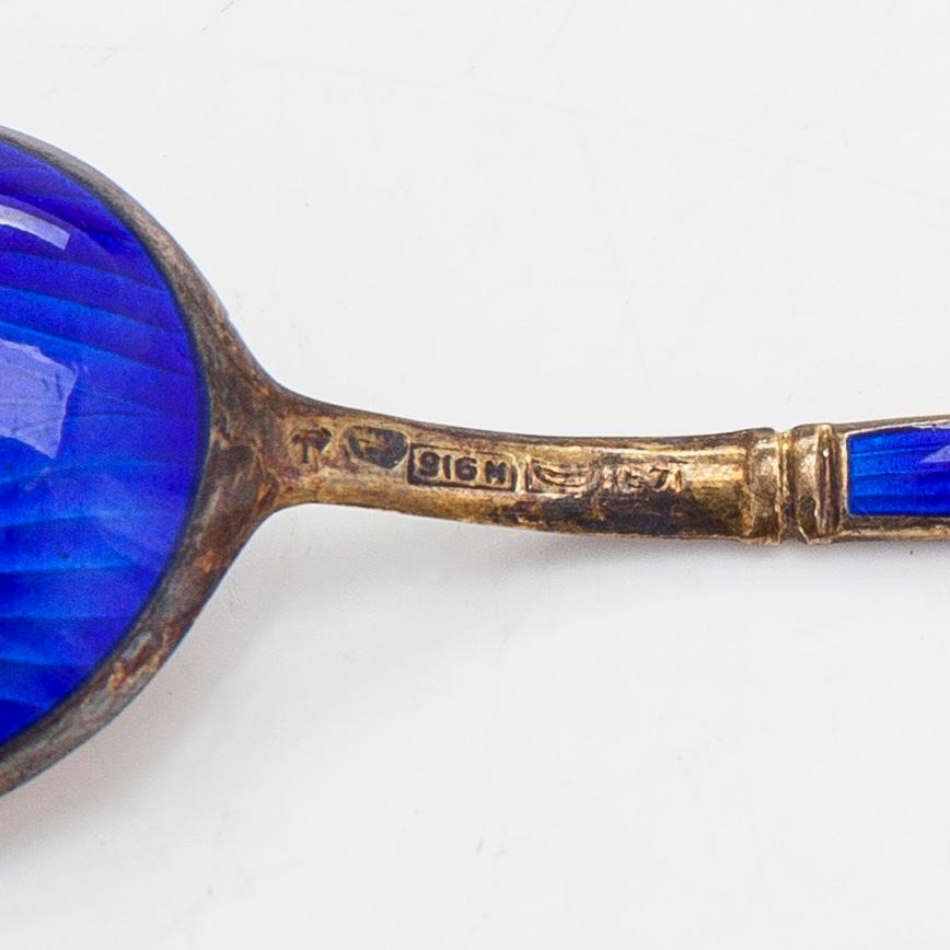 Tillander, sixteen enamelled and gilded silver coffee spoons, Helsinki 1952-65. Twelve in original box.