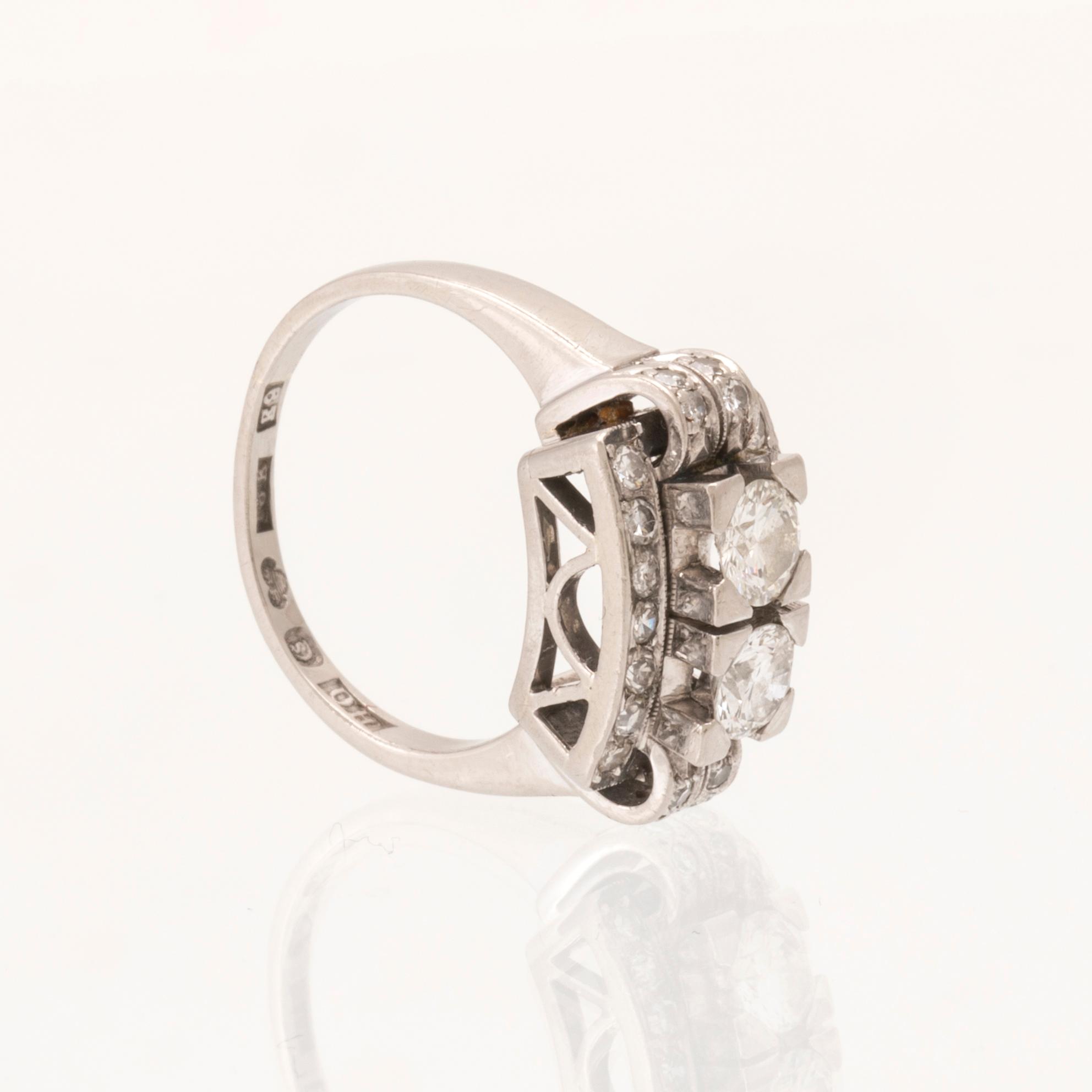 Ring in 18K white gold with round brilliant-cut and single-cut diamonds, Olsson Juvelerare Kristinehamn 1955.