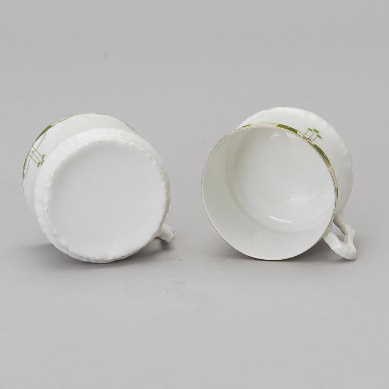 A set of four Kuznetsov porcelain coffee cups with saucers, export marked Fabrique Kousnetzoff, 1890-1913.