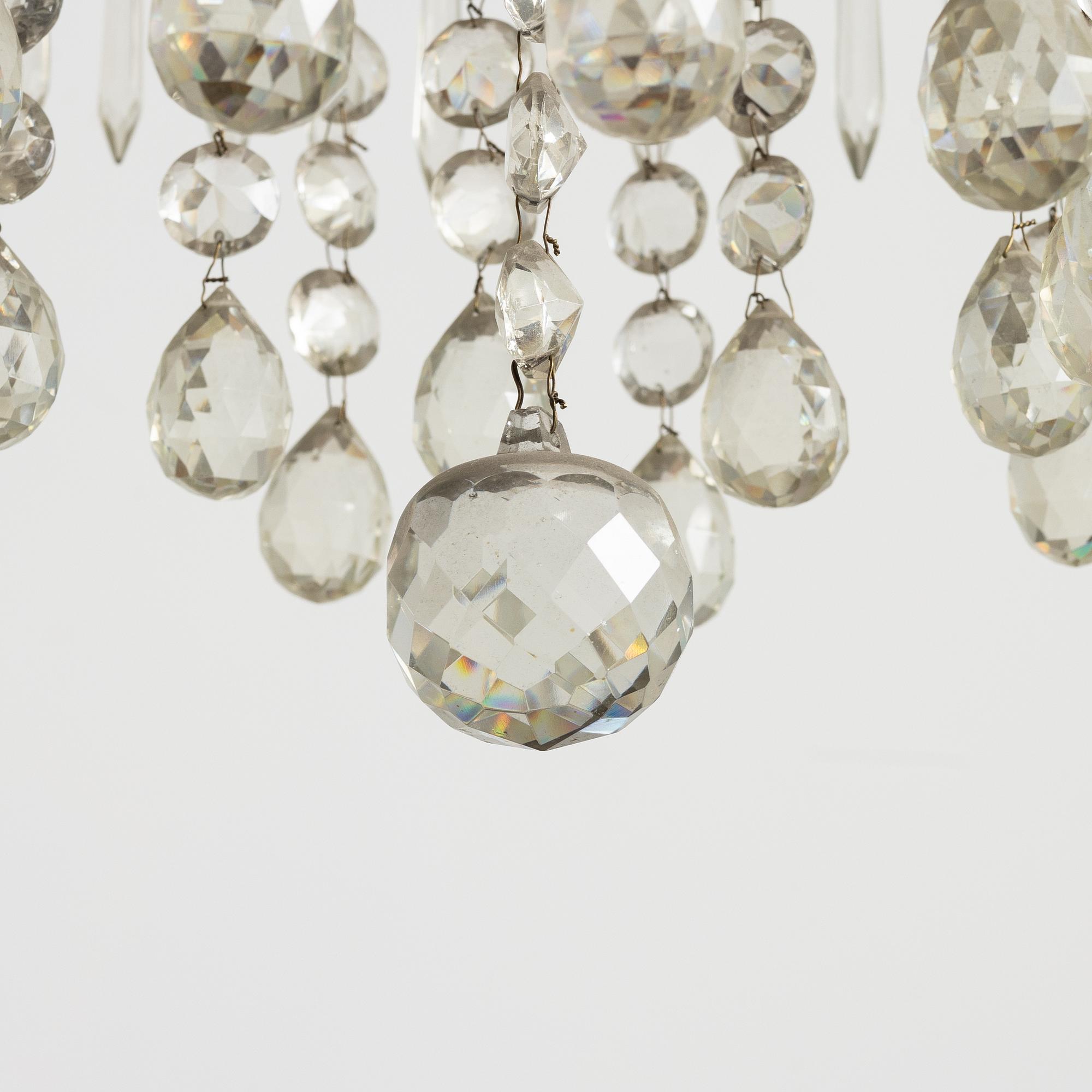 A four-light Gustavian-style chandelier, circa 1900.