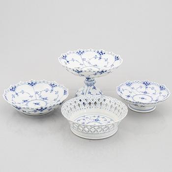 An 84-piece porcelain "blue fluted" dinner and coffee service, full and half lace, Royal Copenhagen, Denmark.