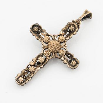 A silver and 14K gold cross with rose-cut diamonds.