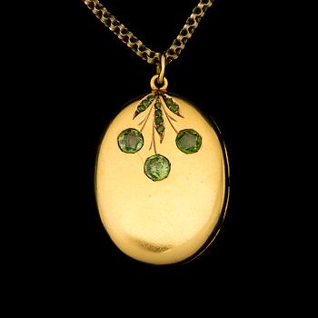 A PENDANT, facetted demantoids, 14K (56) gold. St Petersburg 1864-1908.