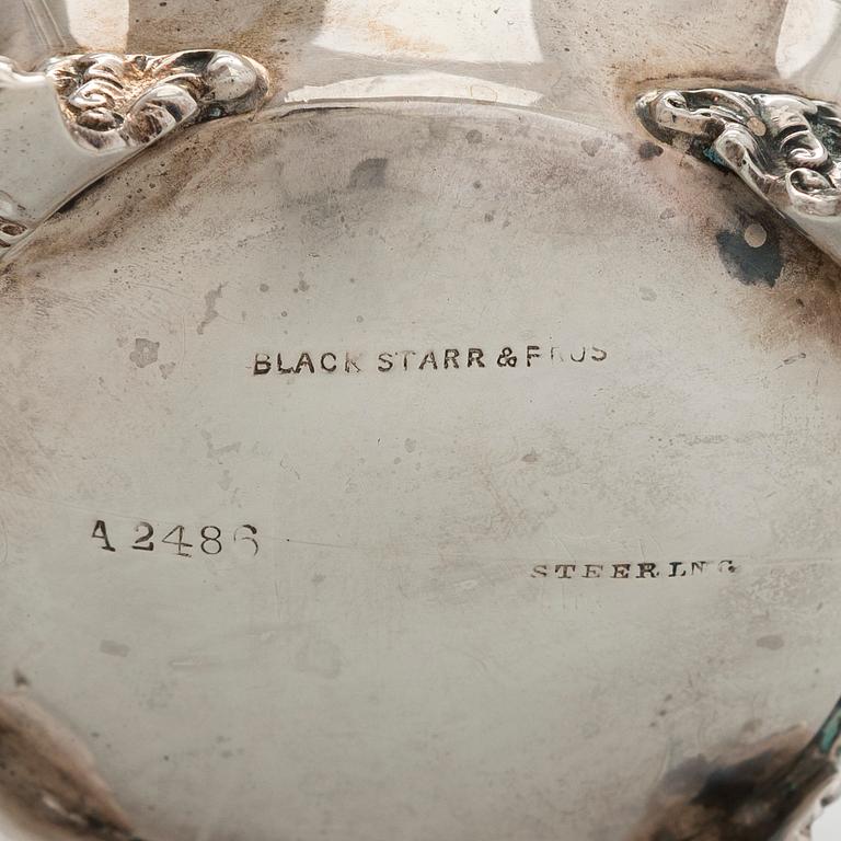 Black Starr & Frost, a pair of sterling silver shakers and sugar bowls, USA around 1900, Gorham pair of sterling spoons.