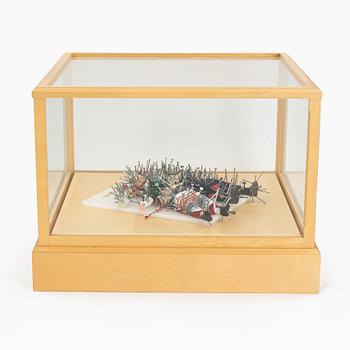 Peter Johansson, mixed media sculpture in glass case, stamped underneath.