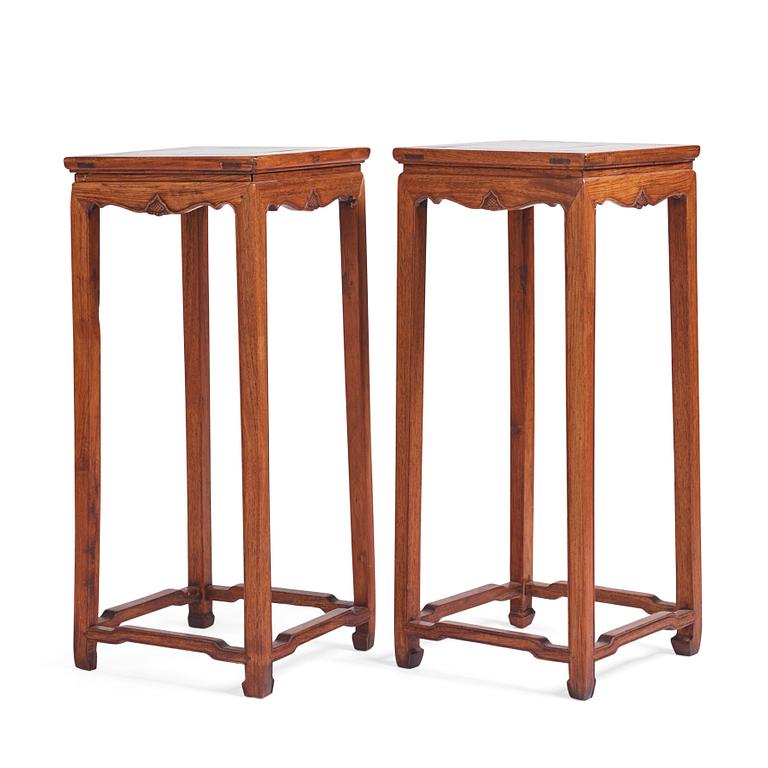 A pair of huanghuali jardiniere stands, Qing dynasty.