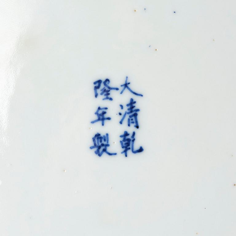 A pair of five clawed dragon dishes, Qing dynasty with Qianlong mark.