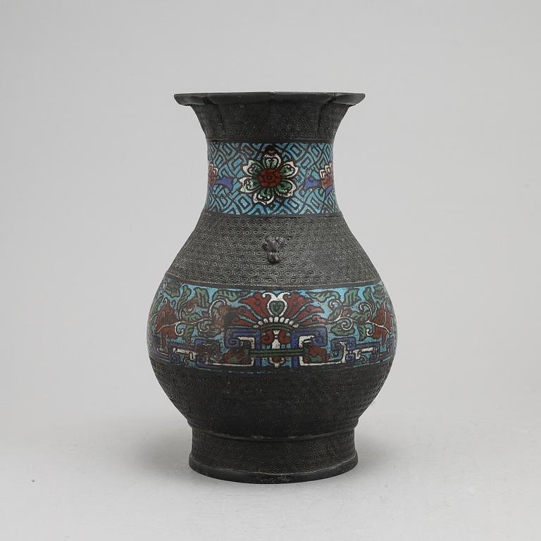 A Chinese bronze and cloisonné vase, around the year 1900.
