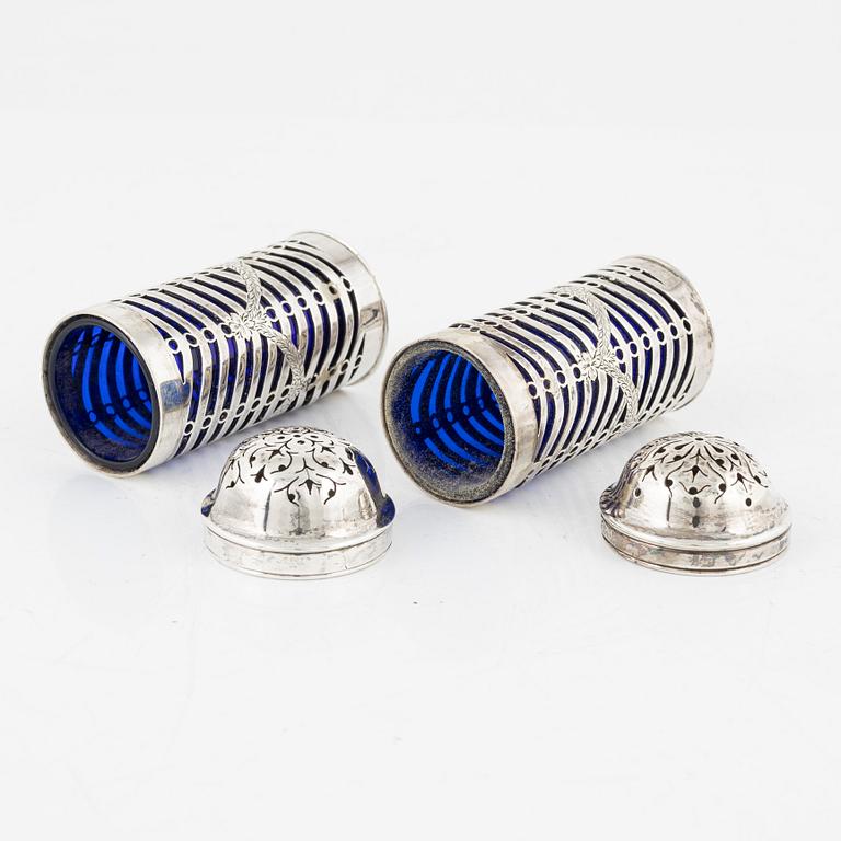 A pair of English salt and pepper shakers, silver and glass, London 1802-3, unidentified makers's mark.