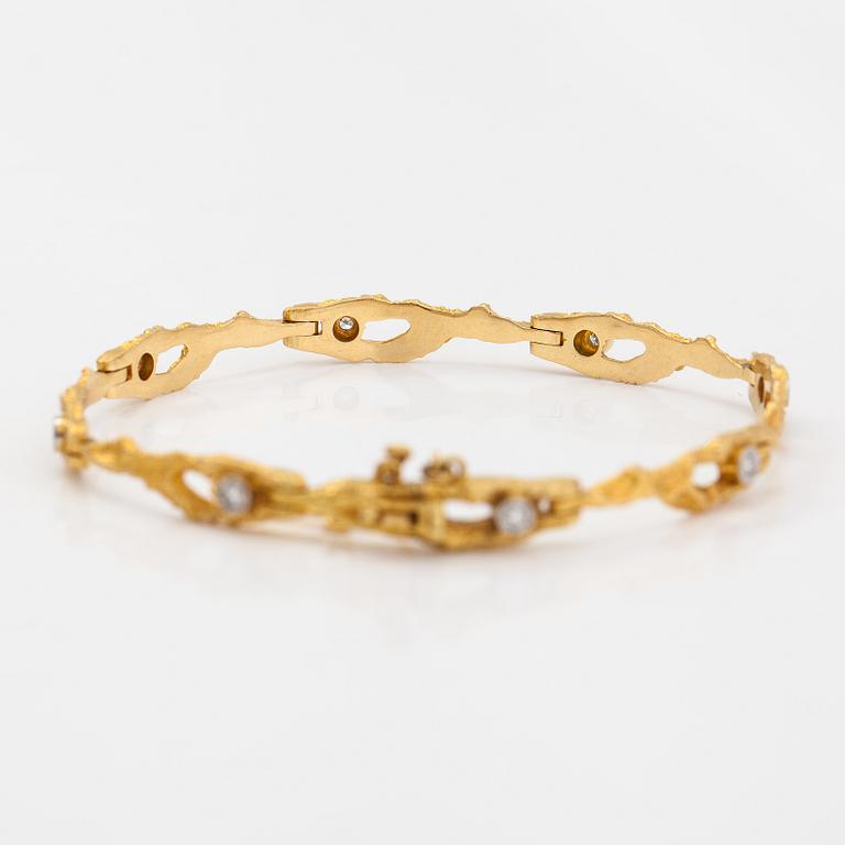 Björn Weckström, Rannekoru "Timanttilampi", 18K kultaa ja timantteja n. 0.16 ct yht. Lapponia 1974.