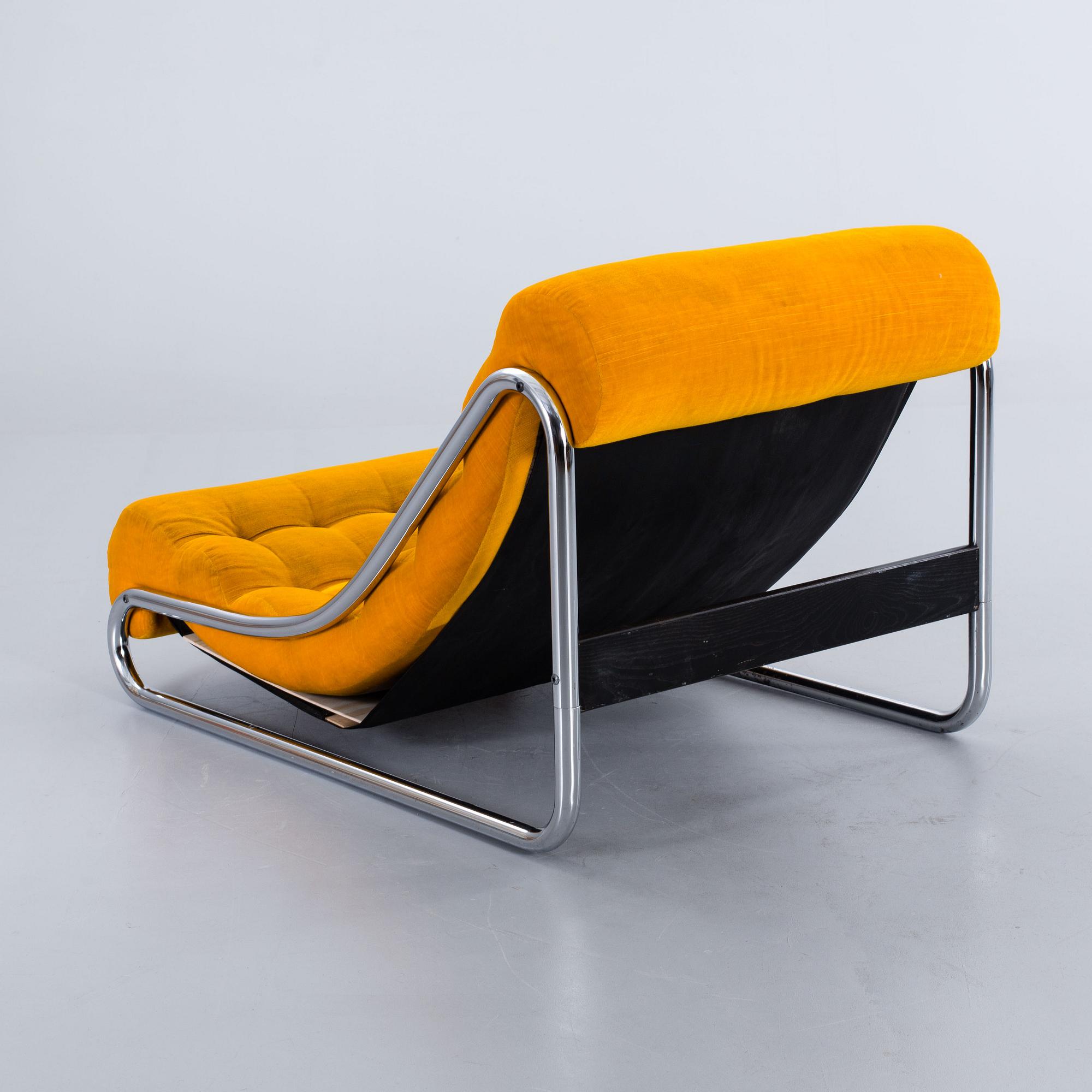 A Gillis Lundgren IKEA Impala armchair and table, 1972.