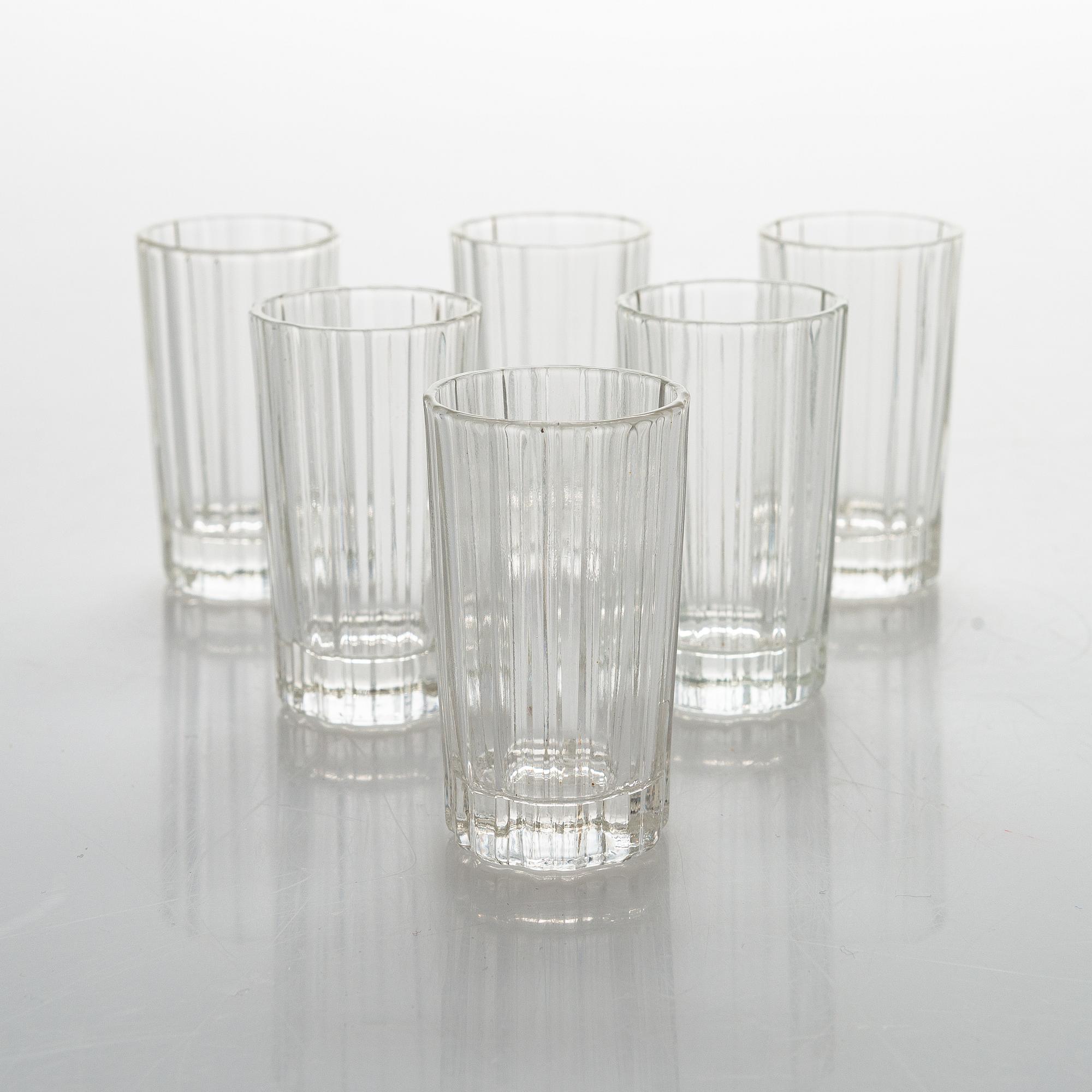 Heikki Orvola, two sets of 70s 'Spektro' schnapps glasses for Arabia, in wood boxes, four and two in each.