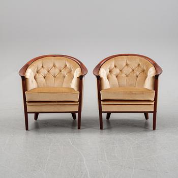 A pair of mahogany and velvet easy chairs by Bröderna Andersson, 1960's.