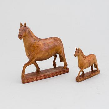 JEMT OLOV PERSON, two wooden horses. Signed.